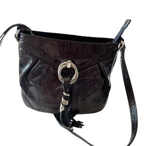 Francesco Biasia black patent leather crossbody bag with silver charm on front